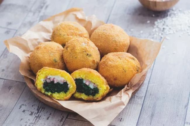 Arancini agli spinaci con caciocavallo