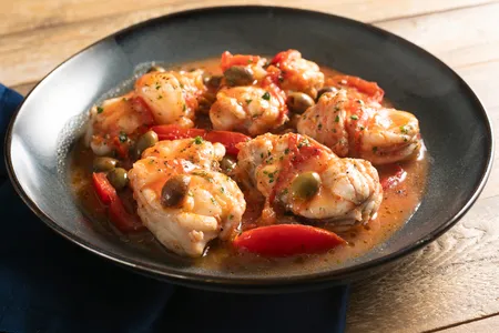 Coda di rospo in umido con olive e pomodoro