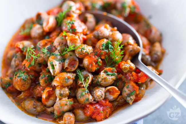 Lumache di mare in umido